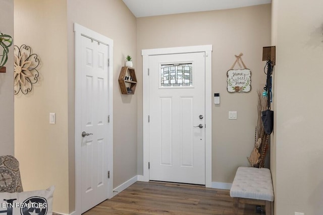 entrance foyer featuring hardwood / wood-style flooring