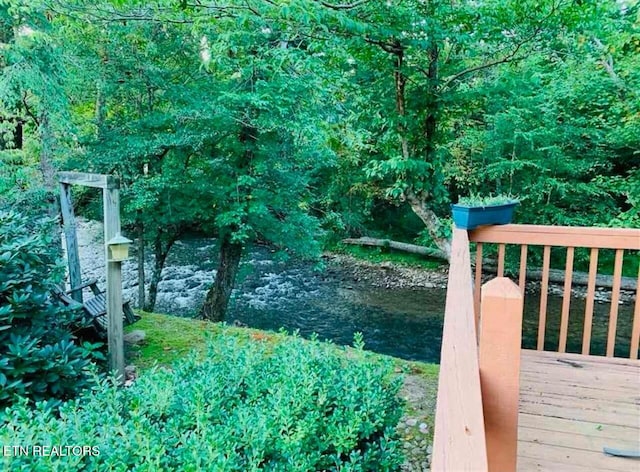 view of yard with a wooden deck