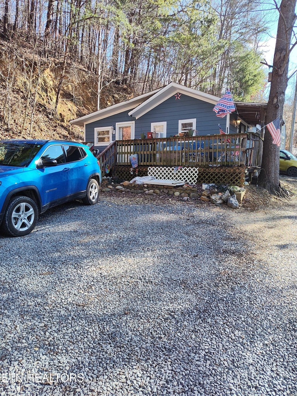 view of front of home with a wooden deck