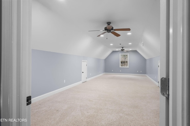 bonus room featuring carpet, a ceiling fan, baseboards, recessed lighting, and lofted ceiling