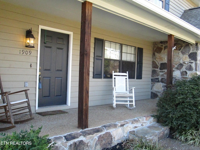 entrance to property with covered porch