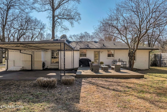 back of house with a lawn and outdoor lounge area