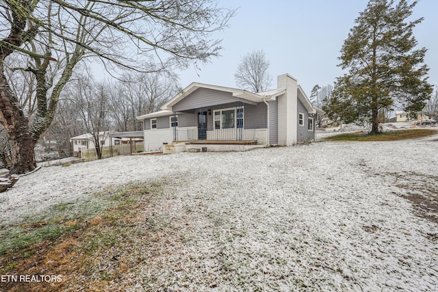 view of front of property featuring covered porch