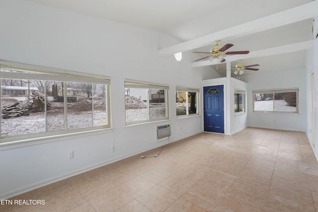 unfurnished sunroom featuring ceiling fan, a wall unit AC, and vaulted ceiling with beams