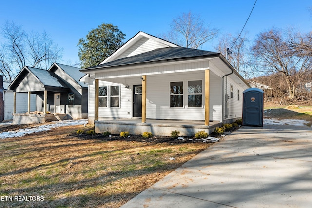 bungalow-style home featuring covered porch