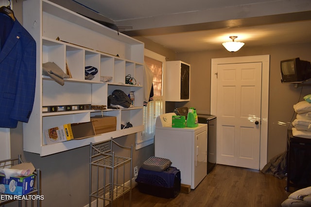 clothes washing area featuring washer / dryer and dark wood-type flooring