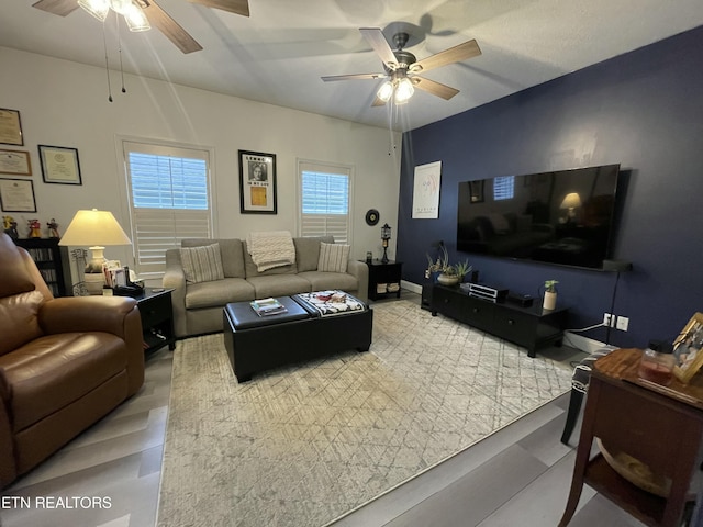 living room featuring ceiling fan