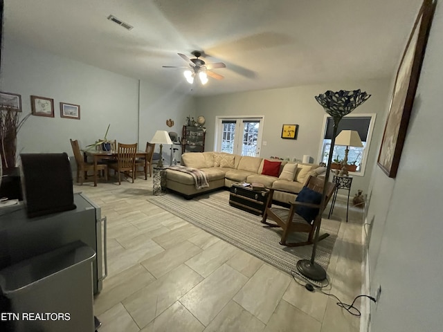 living room with ceiling fan