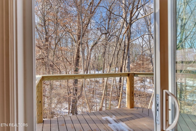 view of snow covered deck