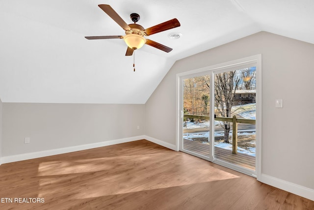 bonus room featuring ceiling fan, lofted ceiling, and hardwood / wood-style floors