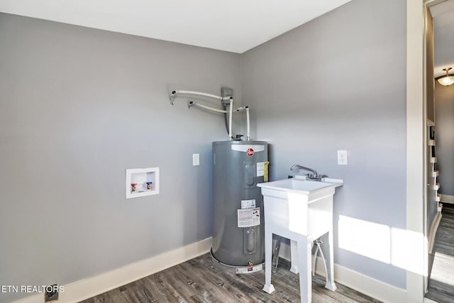 utility room featuring water heater