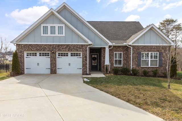 craftsman-style home featuring driveway, a garage, a shingled roof, a front lawn, and board and batten siding