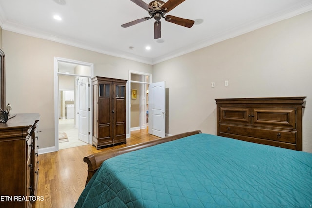 bedroom featuring light wood-type flooring, ceiling fan, ornamental molding, and ensuite bath