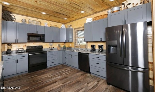 kitchen featuring black appliances, sink, light stone countertops, dark wood-type flooring, and wooden ceiling