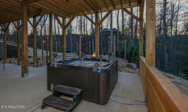 view of patio with a hot tub