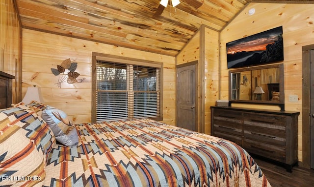 bedroom featuring lofted ceiling, wood walls, and wood ceiling