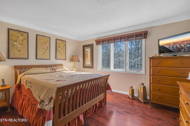 bedroom with ornamental molding, dark hardwood / wood-style floors, and a textured ceiling