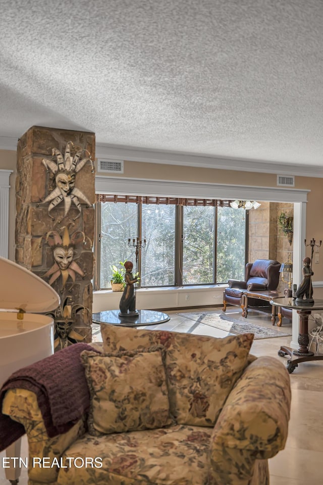 living room with a textured ceiling