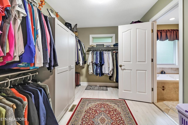 56 Westridge Ct, Fairfield Glade, TN 38558 - walk in closet with light wood-type flooring