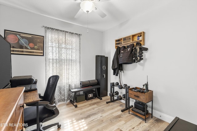 office with ceiling fan and light wood-type flooring