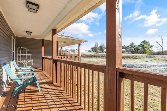 wooden deck with a porch