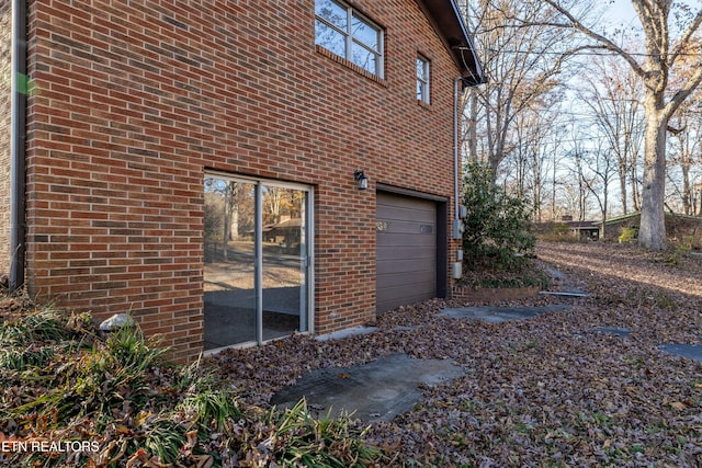 view of property exterior featuring a garage