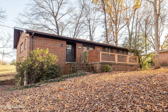 view of front of home with a deck