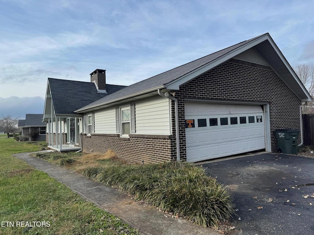 view of property exterior with a garage