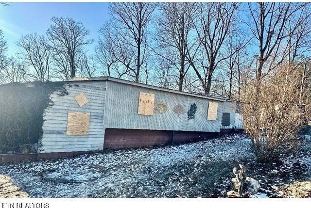 view of snow covered property