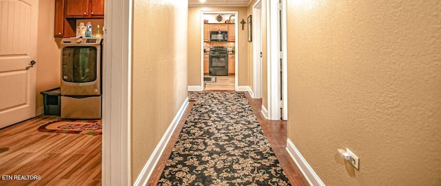 hallway with wood-type flooring