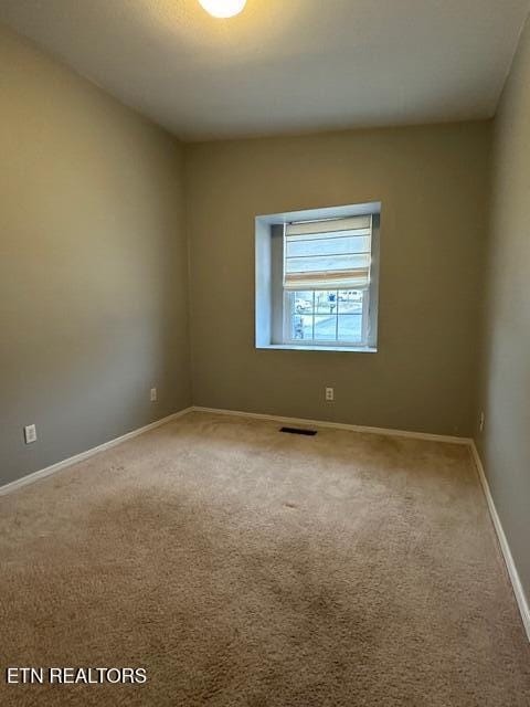 view of carpeted empty room