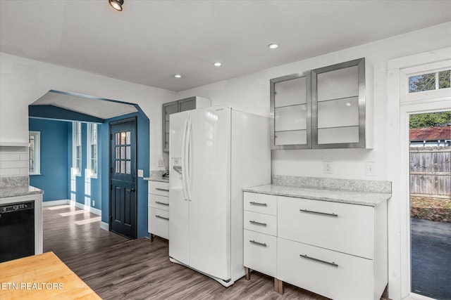 kitchen with dark wood-type flooring, gray cabinets, dishwasher, and white fridge with ice dispenser