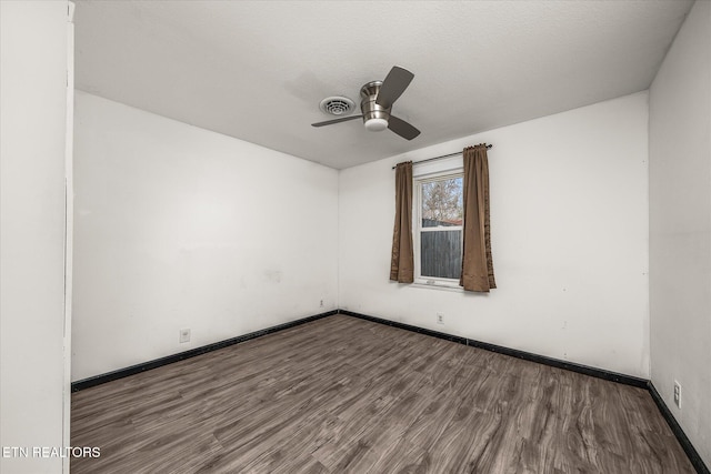 unfurnished room with hardwood / wood-style floors, a textured ceiling, and ceiling fan