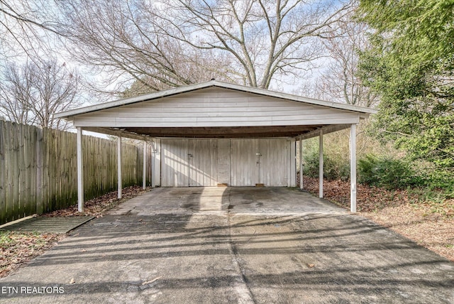 view of parking / parking lot with a carport