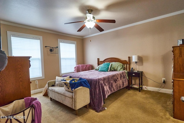 bedroom featuring ceiling fan, carpet flooring, and crown molding