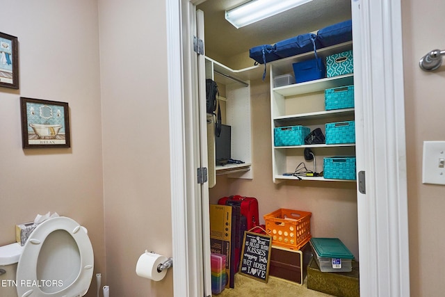 bathroom featuring toilet