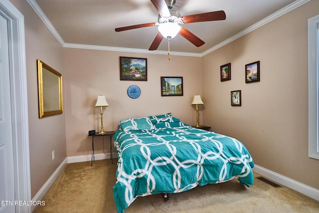 bedroom with ceiling fan, ornamental molding, and carpet flooring