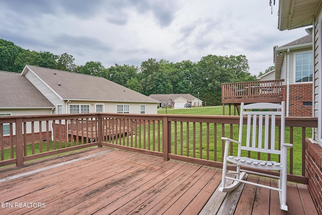 deck featuring a lawn