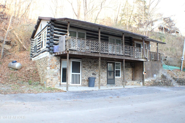 exterior space featuring a wooden deck