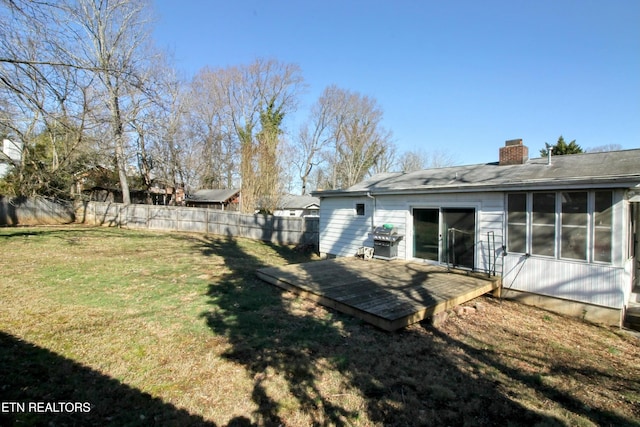 view of yard with a deck