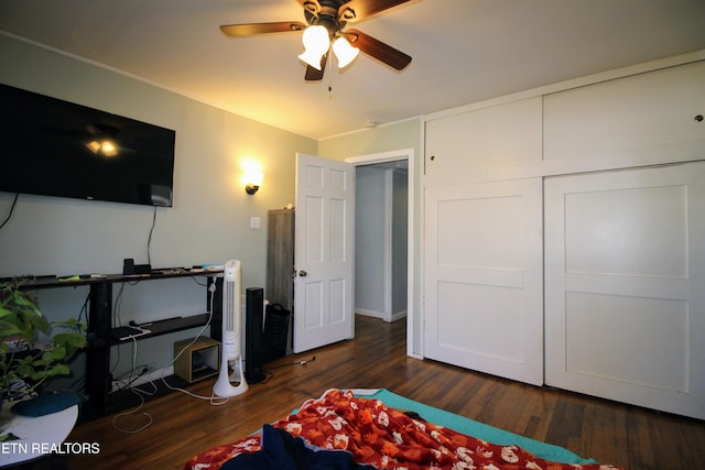 bedroom featuring dark wood-type flooring and ceiling fan