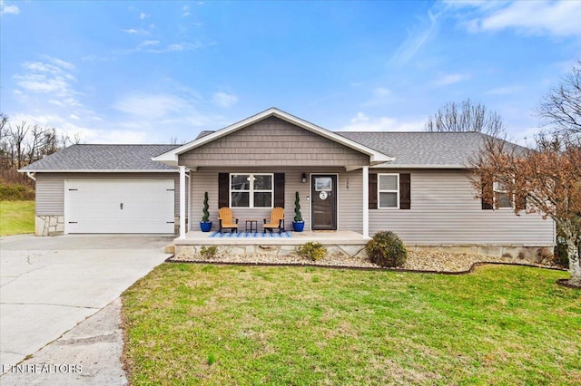 ranch-style home with a porch, a garage, and a front yard