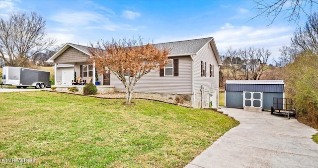 view of front of house featuring a porch, a storage unit, a front lawn, and a garage