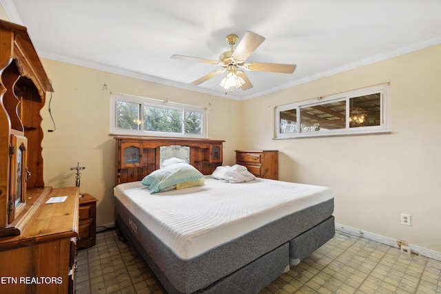 bedroom featuring ornamental molding and ceiling fan