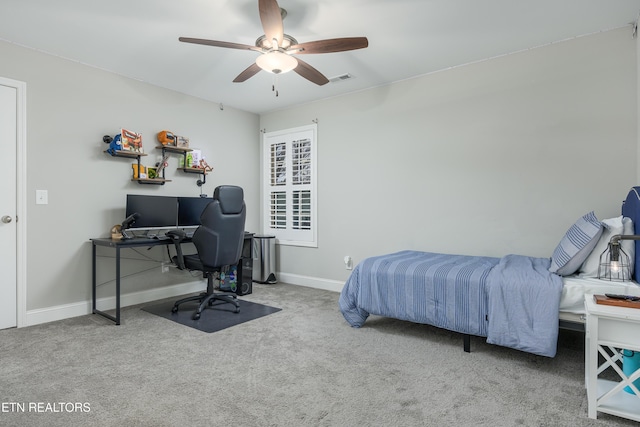 carpeted bedroom with ceiling fan