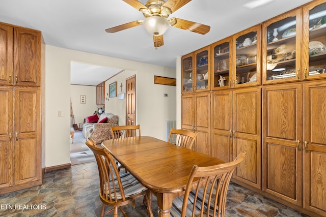 dining room with ceiling fan