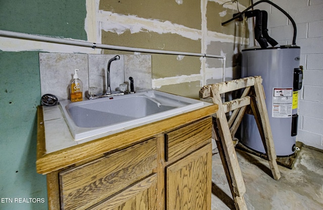 kitchen featuring tasteful backsplash, sink, and electric water heater