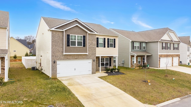 view of front facade featuring a garage and a front lawn