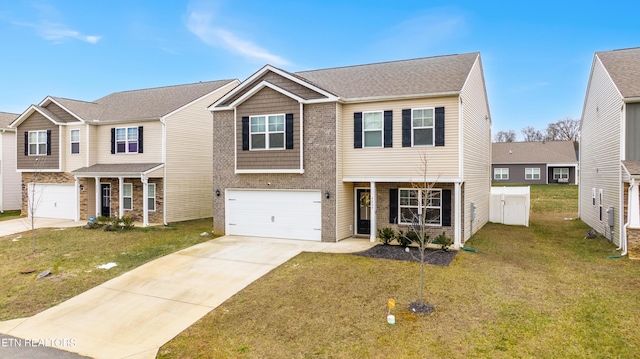 view of front of house featuring a garage and a front yard