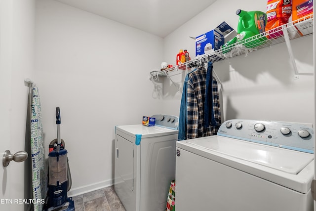 laundry room with washing machine and clothes dryer